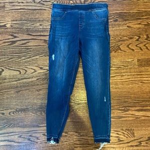 Worn out pair of spanx jeans